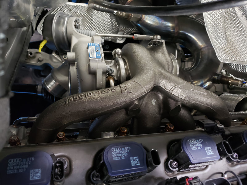 Turbo location into stock manifold for TT RS