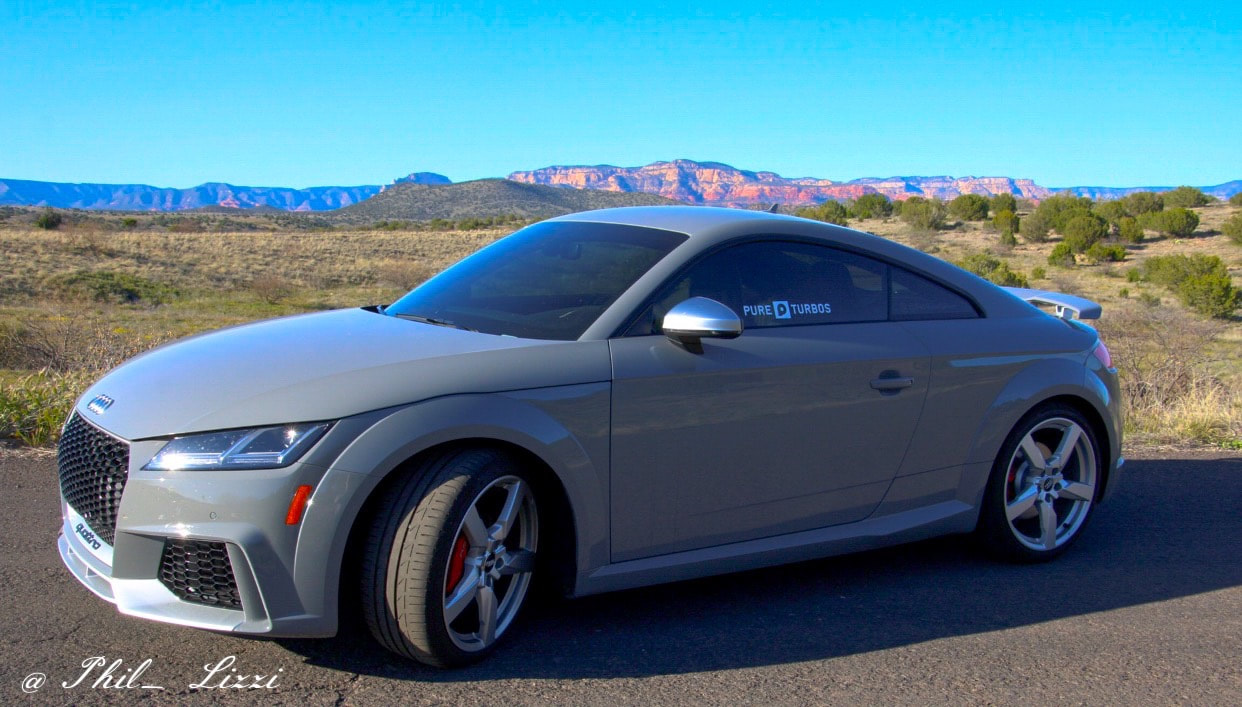 TT RS with Sedona red hillsides in background 