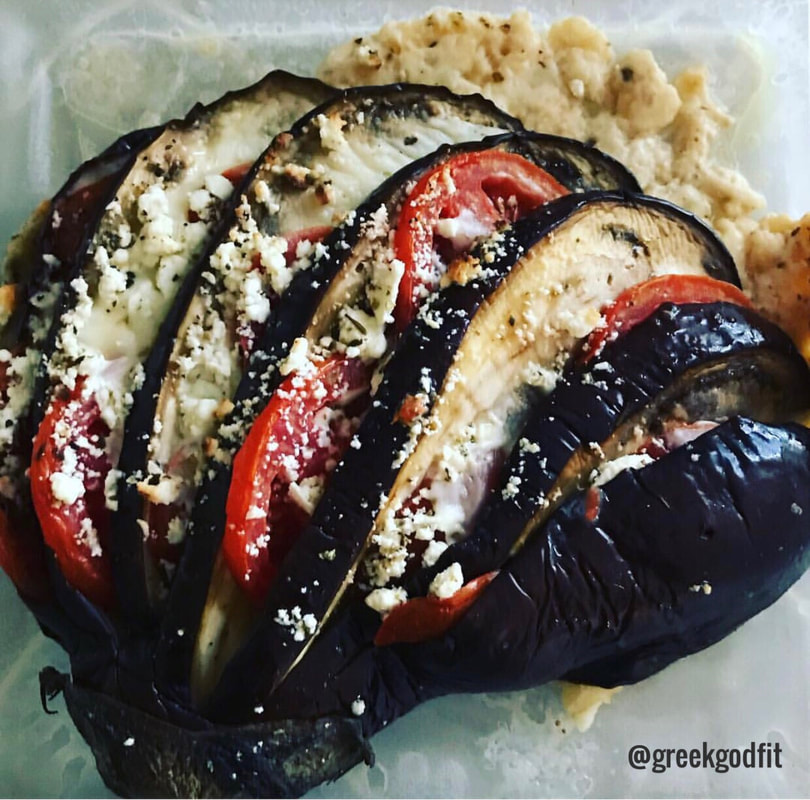 Eggplant with feta cheese mozzerella and tomato